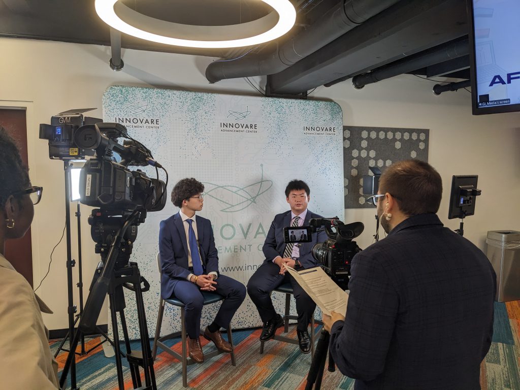 Photo of Edmond and Oscar Yang