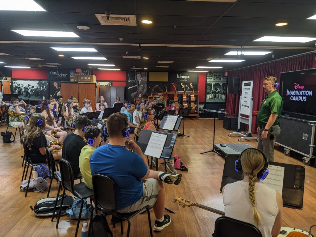 Photo of Waterville Central School marching band and swing choir students playing instruments at Walt Disney World’s Epcot
