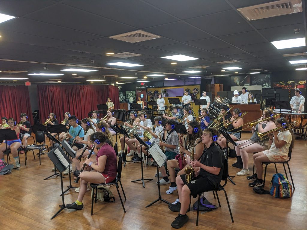Photo of Waterville Central School marching band and swing choir students playing instruments at Walt Disney World’s Epcot
