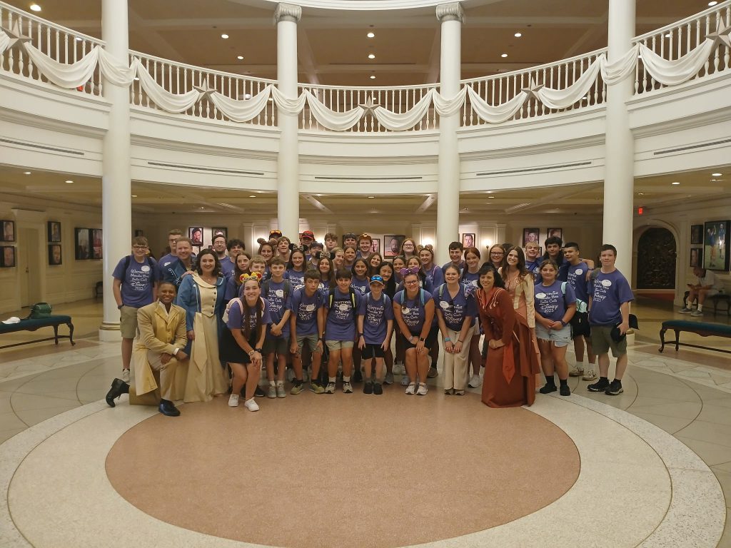 Photo of Waterville Central School marching band and swing choir students at Walt Disney World’s Epcot