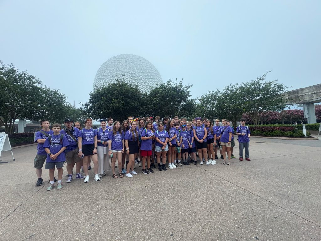 Photo of Waterville Central School marching band and swing choir students at Walt Disney World’s Epcot