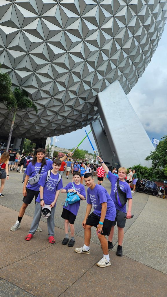 Photo of Waterville Central School marching band and swing choir students at Walt Disney World’s Epcot
