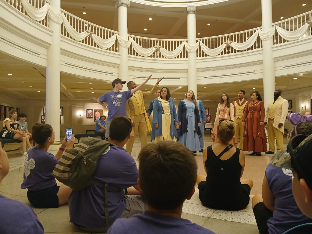 Photo of Waterville Central School marching band and swing choir students at Walt Disney World’s Epcot
