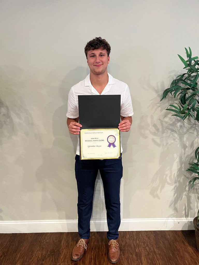Photo of student holding a certificate