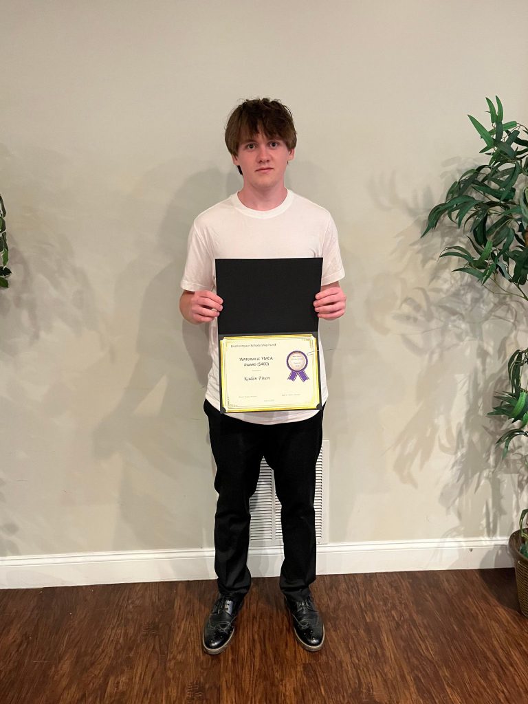 Photo of student holding a certificate