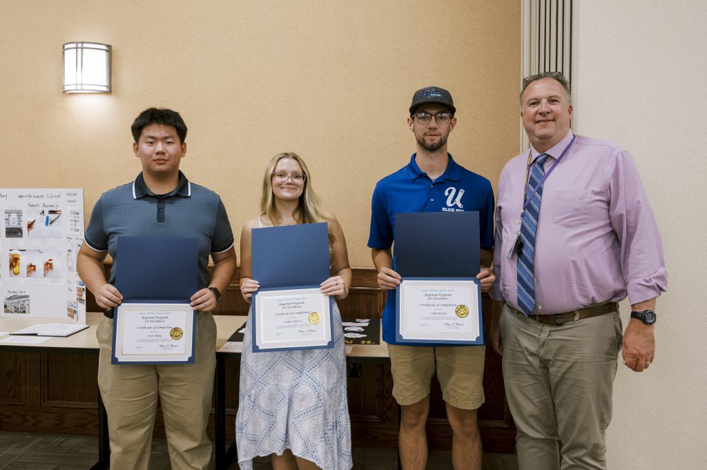 Photo Caption (left to right): Oscar Yang, Peyton Harris, Caleb Rotach and Andre Paradis, Waterville Jr./Sr. High School Principal