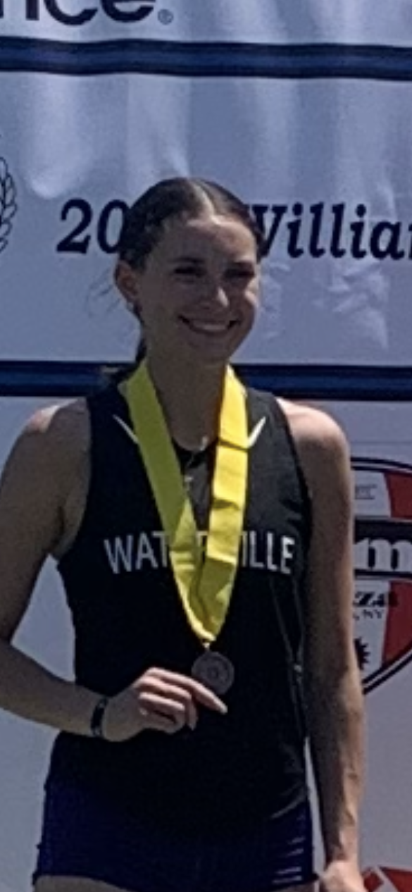 Photo of Kady Barton holding a medal